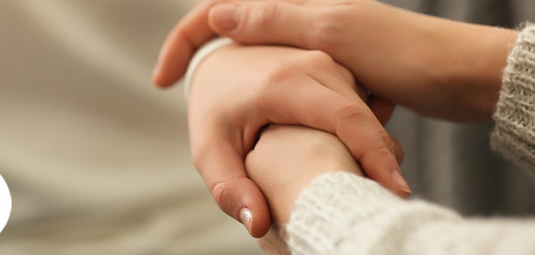 Hands holding each other