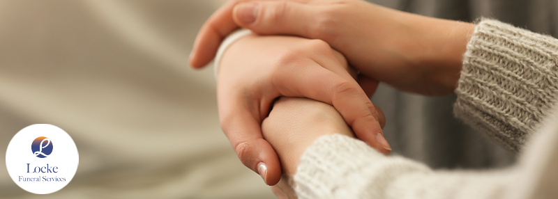 Hands holding each other